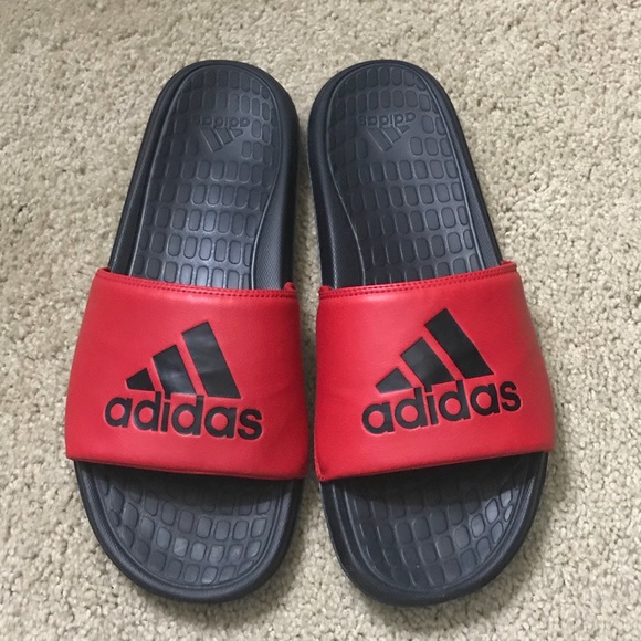 red and black adidas slides